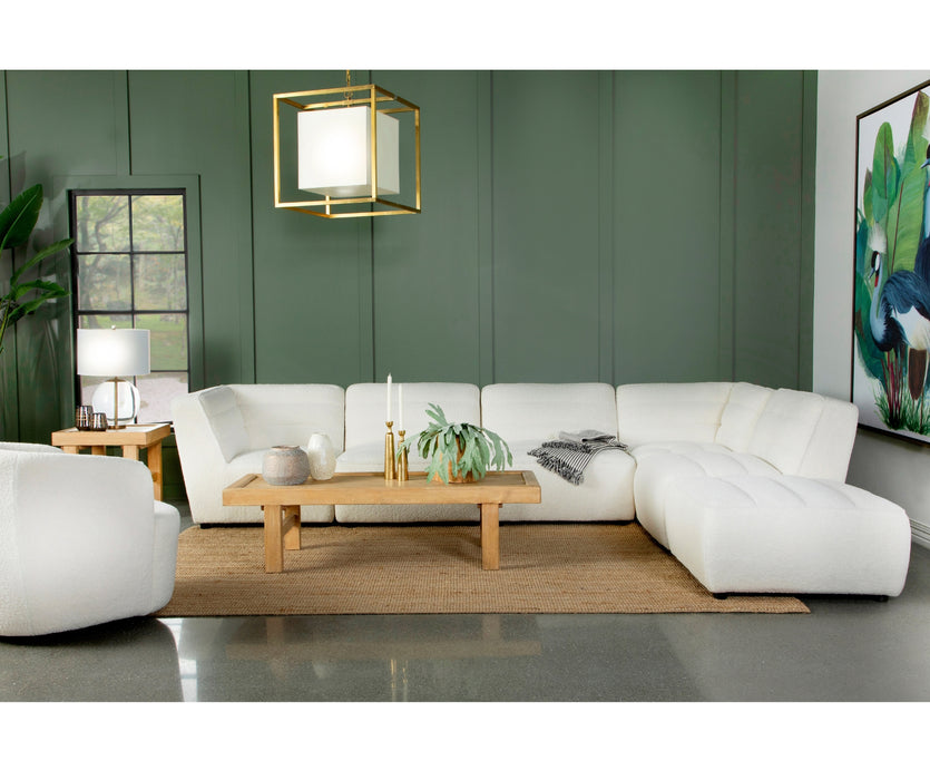 White Sheep Skin 6-piece low profile sectional in natural tone.