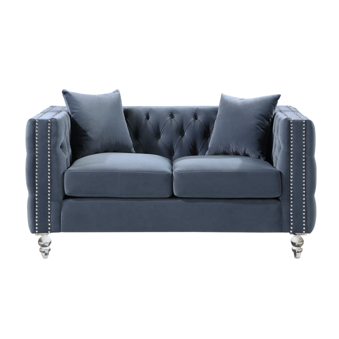 Glamorous Orina blue tufted velvet loveseat with acrylic legs.